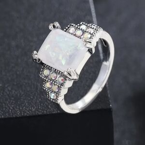 Elegant Silver and White Gemstone Ring with Diamonds‎